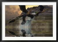 Framed Two Microraptor dinosaurs fly near mountain waterfalls in prehistoric times