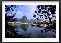 Framed Wonderful ragged Limestone Mountains and Li River and city life of Yangshuo area of China