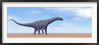 Large Argentinosaurus dinosaur walking in the desert Framed Print