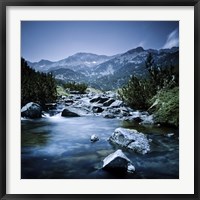 Framed Small river flowing through the mountains of Pirin National Park, Bulgaria