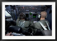 Framed Airmen at Work in a MC-130H Combat Talon II