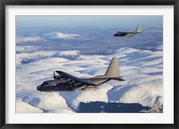 Framed MC-130P Combat Shadow and MC-130H Combat Talon Over Clouds