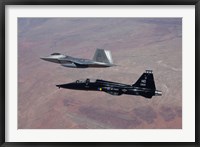 Framed F-22 Raptor and T-38 Talon Fly in Formation over New Mexico