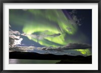 Framed Aurora borealis over Fish Lake, Yukon, Canada
