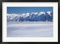 Framed Roundhill Ski Area with fog covered Lake Tekapo and the Hall Range, South Island, New Zealand