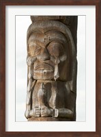 Framed Gitksan totem pole, Kispiox Village, British Columbia