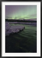 Framed Aurora Borealis over Creek, Yukon, Canada