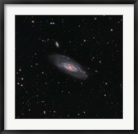 Framed Messier 106, a spiral galaxy in the Constellation Canes Venatici