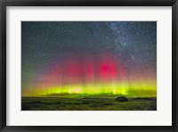 Framed Aurora borealis above Grasslands National Park in Saskatchewan, Canada