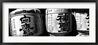 Framed Close-up of three dedicated sake barrels, Imamiya Temple, Kita-ku, Kyoto, Japan