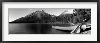 Framed Canoe in lake in front of mountains, Leigh Lake, Rockchuck Peak, Teton Range, Wyoming