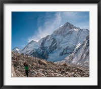 Framed Trekkers and porters on a trail, Khumbu Valley, Nepal