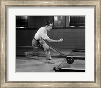 Framed 1950s Side View Of Man Bowling