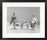 Framed 1950s Family Of Four Walking Towards Camera