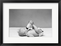 Framed 1940s Baby Prone Drinking From Milk Bottle